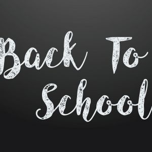 Back to school message with pencil schoolbag school-bus and leaves